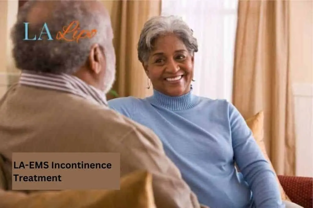 Couple sat smiling at each other - LA-EMS treatment Buckinghamshire