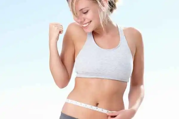 woman happy after fat reduction treatment Buckinghamshire