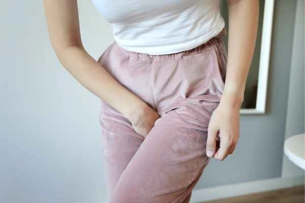 woman running for the toilet because of urinary incontinence Buckinghamshire